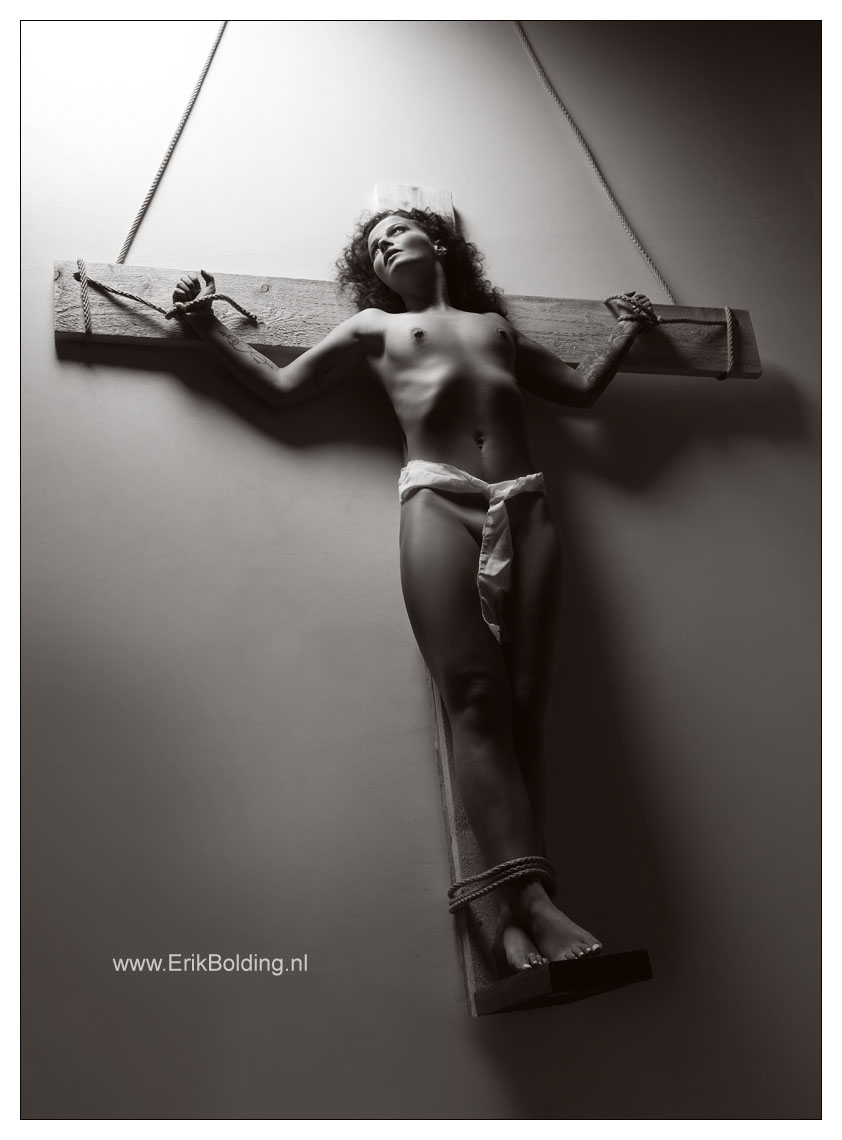 crucified and blindfolded